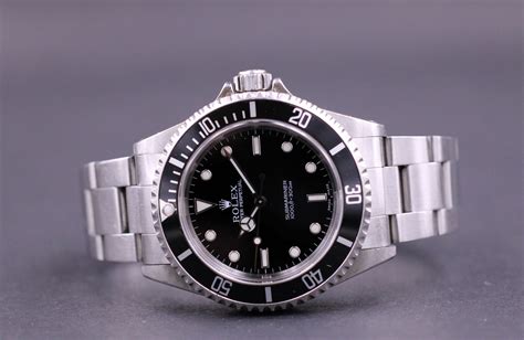 Rolex submariner 14060m 2 line